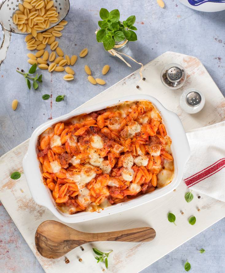 Ñoquis sardos al horno con salsa picante de salchicha y queso provola