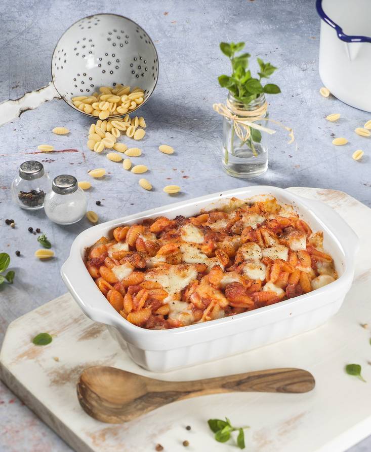 Ñoquis sardos al horno con salsa picante de salchicha y queso provola