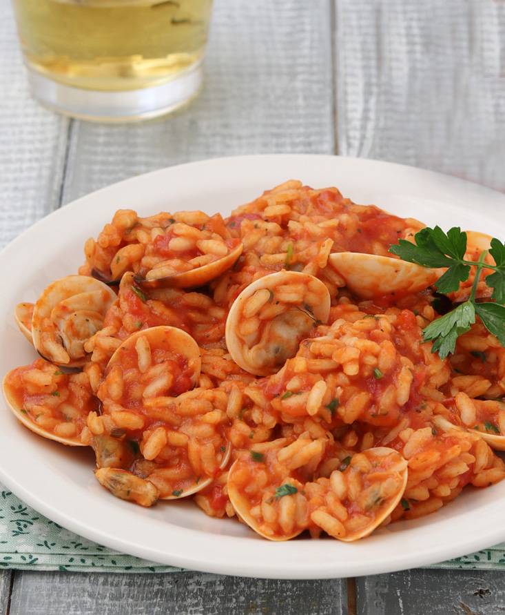 Risotto con vongole al pomodoro